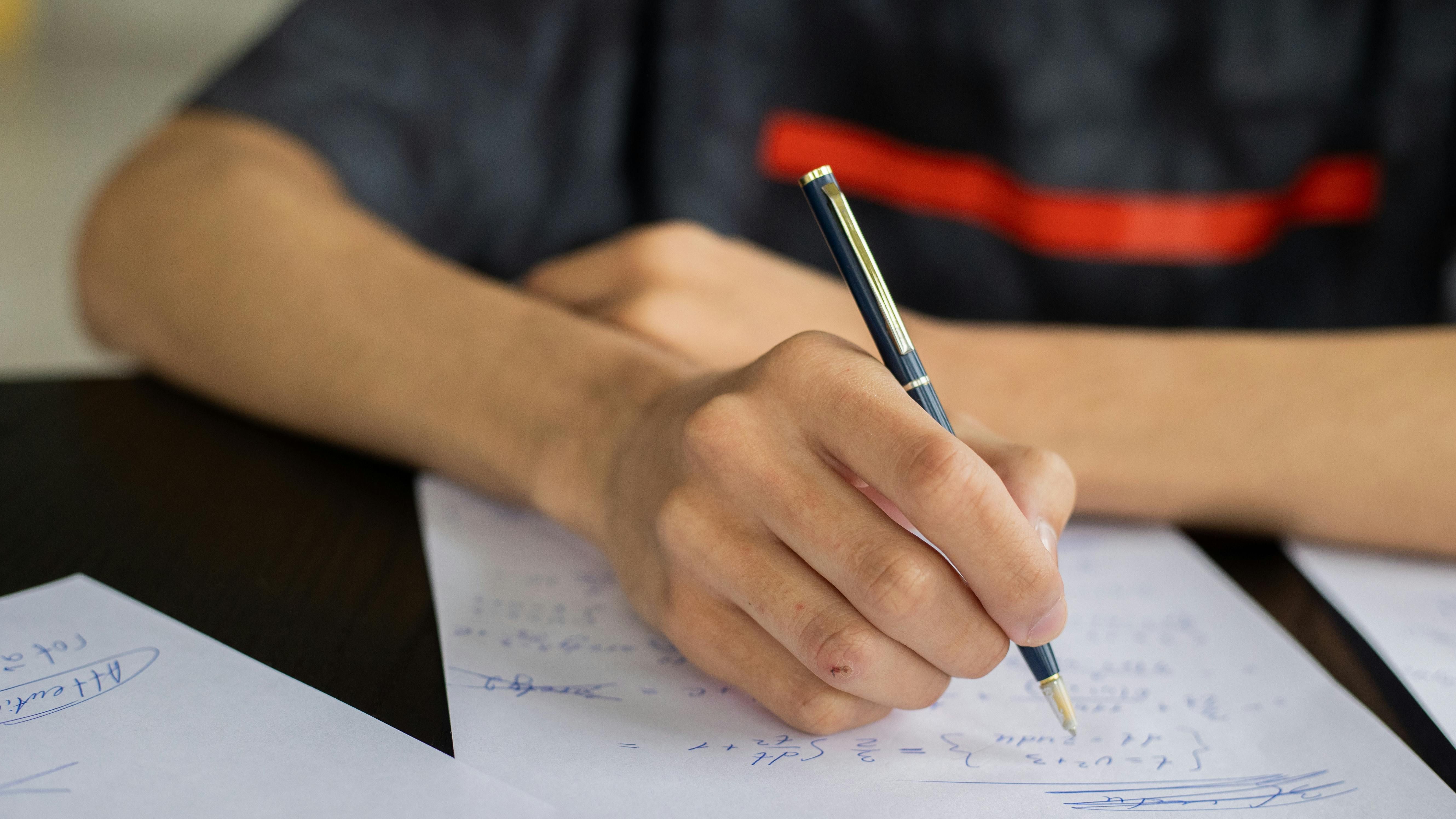 A man writing notes